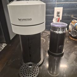 Nespresso Vertuo Espresso Next Machine with a milk frother