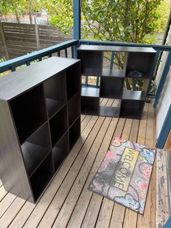 Two brown/black cube shelves with stacking hardware