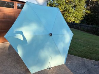 Tropitone 8.5' Octagon Umbrella with Manual Lift