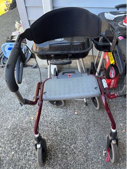 Gently used 4 wheel walker