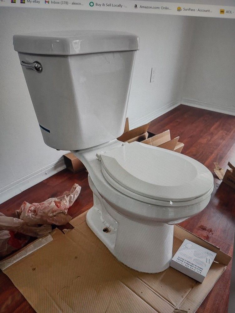 Glacier Bay toilet 26 inch in depth, 30 inches tall in great conditions new flange in box