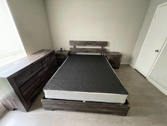 Queen bedroom set with 2 night stands and a dresser with box spring  for $100