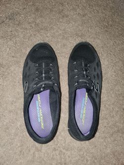 Sketcher's women's black slip on sneakers size 7