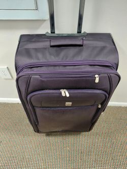 30" suitcase purple$25 check in bag