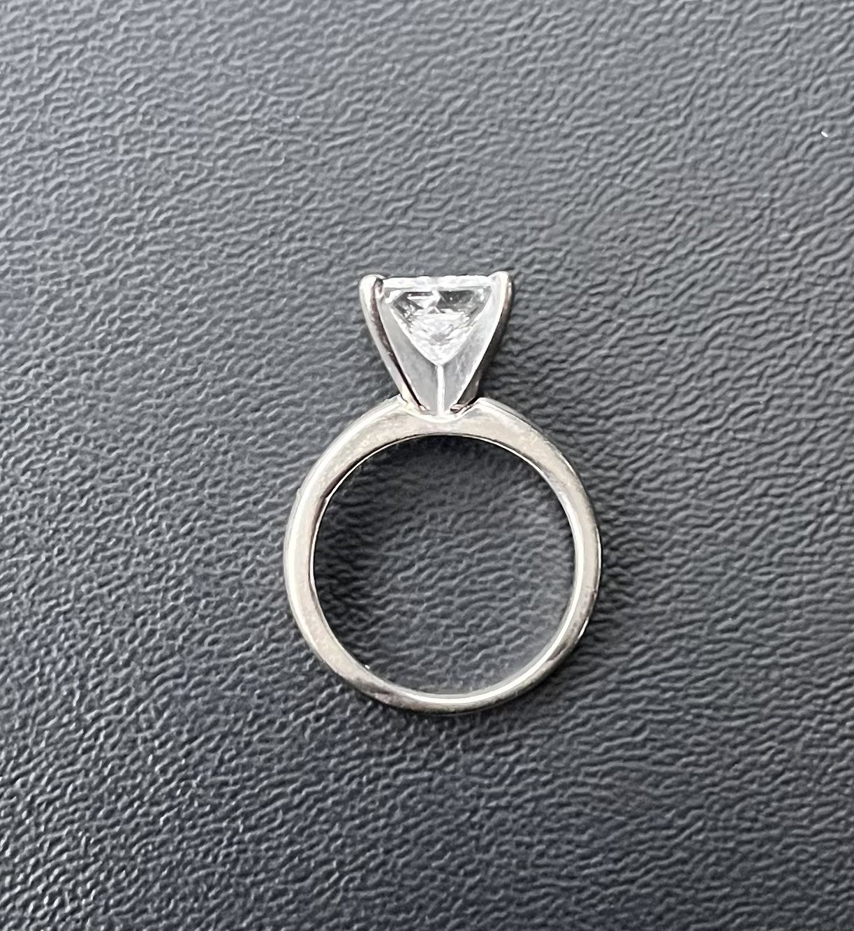 Wedding Ring. 14k White Gold and A moissanite gem