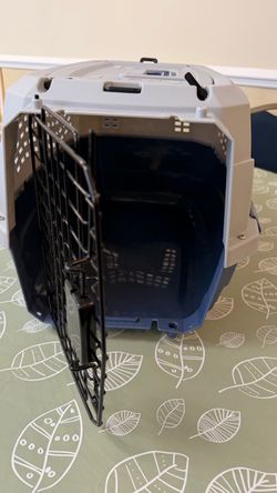 Pet Supply Bundle with a Carrier, Bed, Toys, and Grooming Kit