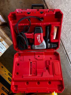 New Milwaukee corded rotary hammer. Try before you buy. Pickup only.