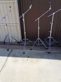 Cymbal boom stands (various brands).