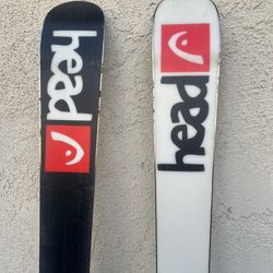 Head Snow Skis with Bindings 68”long 5”wide at end 3”wide in the middle Peak 12 Bindings
