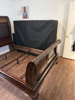 Queen bed and dresser and mirror