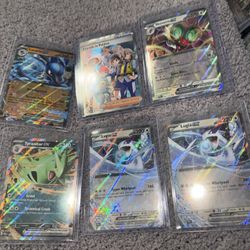 Prismatic evolutions ex’s and pokeball pokemon cards 