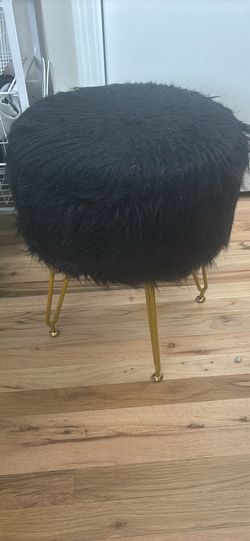 Black fuzzy stool with strorage