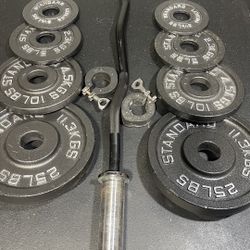 OLYMPIC CURLBAR AND WEIGHTS 