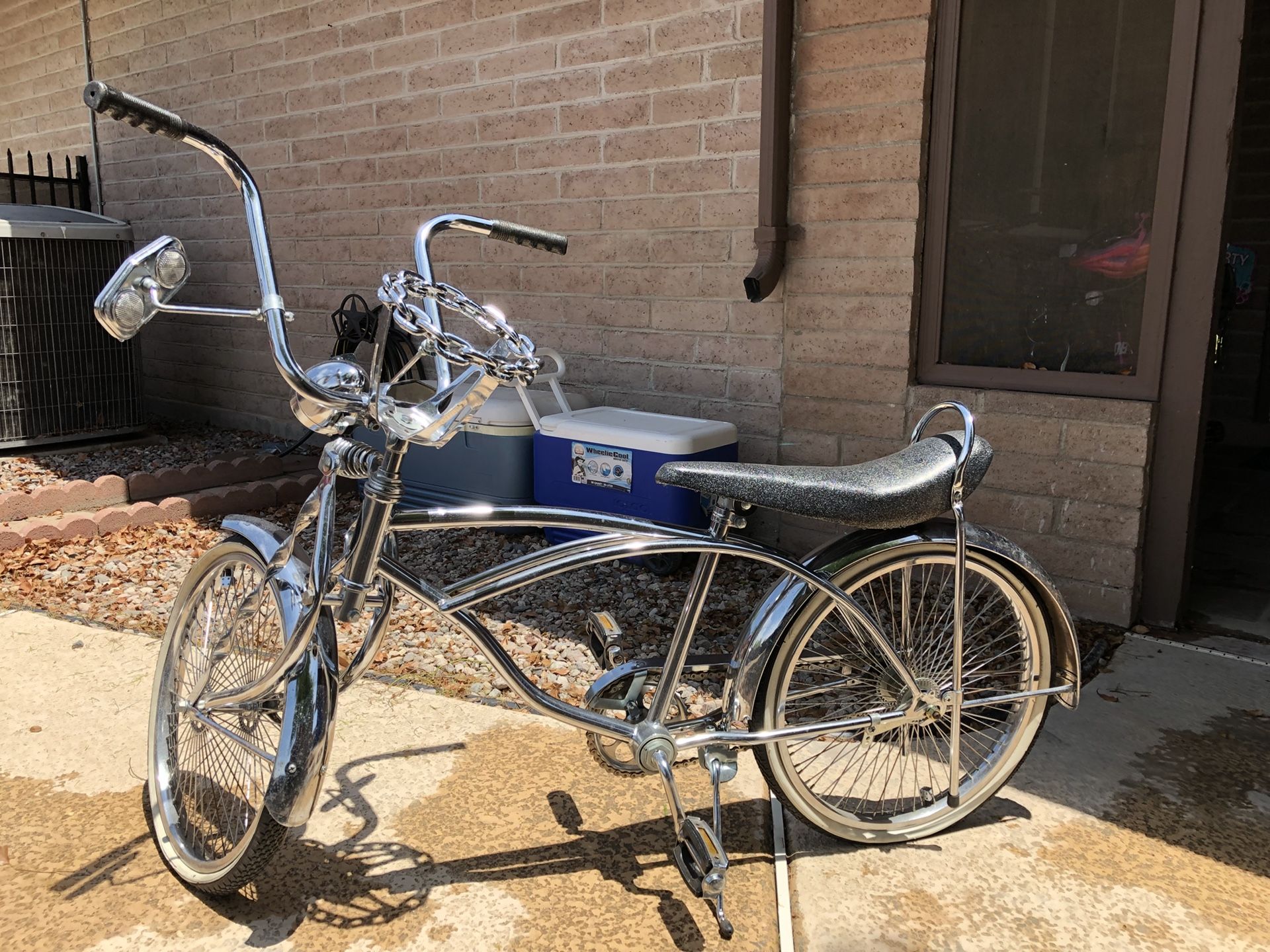 Lowrider bike with chain steering wheel.