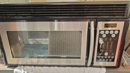 Frigidaire 1.6 cu. ft. over-the-range microwave and vent hood combo