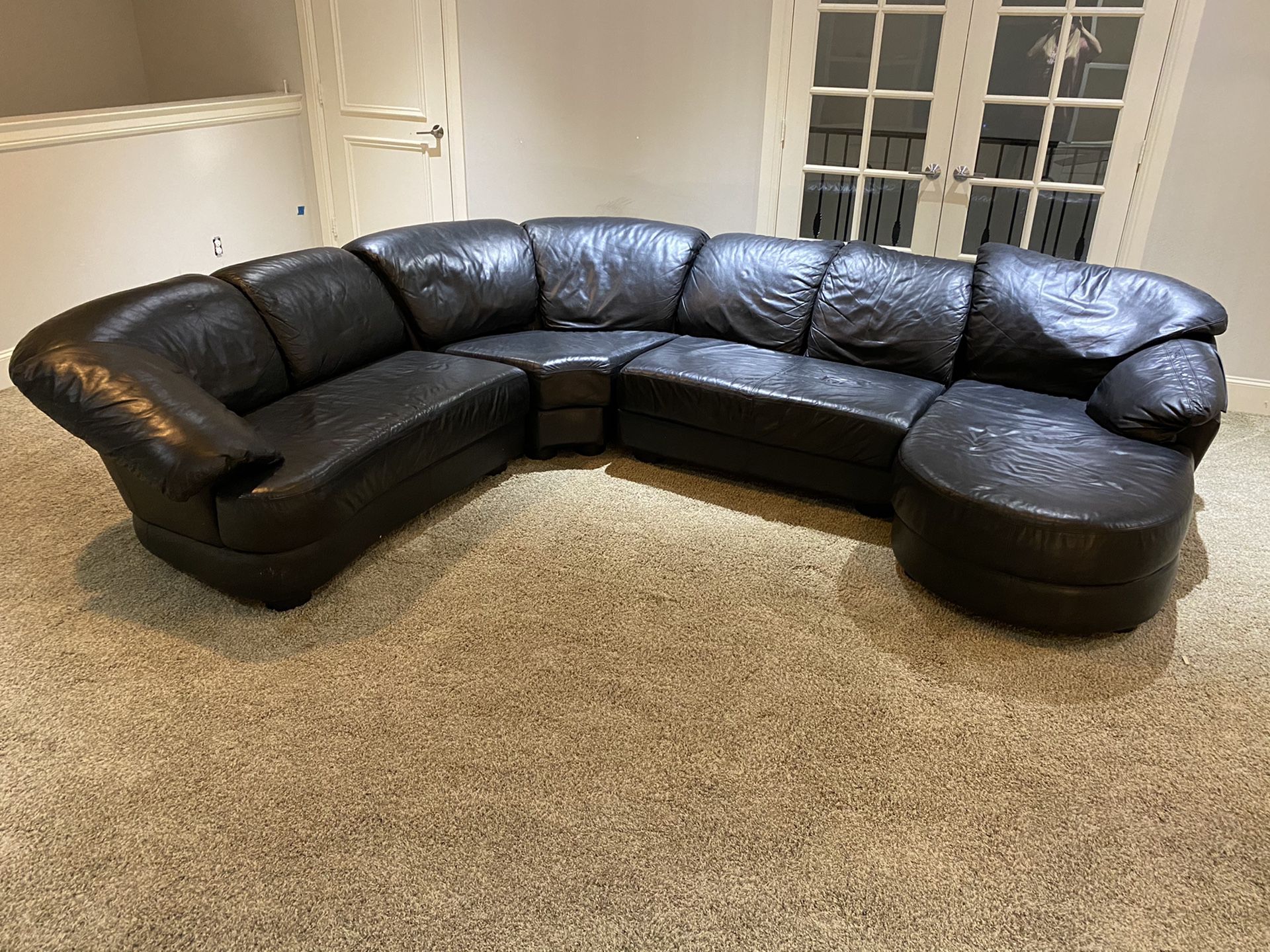 Four Piece Leather Sectional Sofa