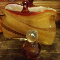 Glass purse with perfume bottle.