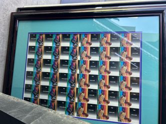 Framed uncut card sheet