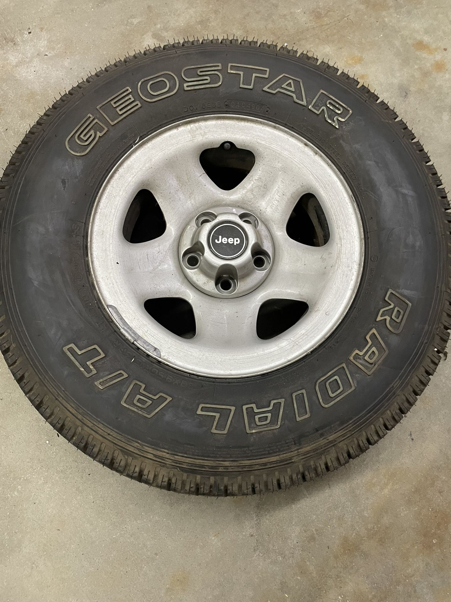 Jeep 15" Steel Wheel With 30x9.5 Tire.