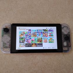 NINTENDO SWITCH LITE with 125 SWITCH + 125 Switch GAMES and 7500 RETRO ARCADE GAMES