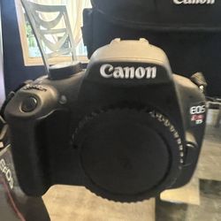 Canon EOS rebel T5, digital single lens reflex camera, including two additional lenses, charger, and carrying case