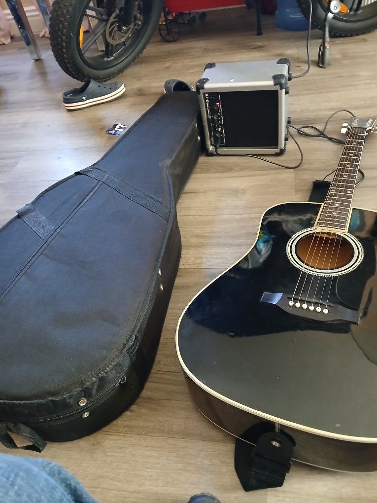 GITARRA CON BOSINA BUENAS CONDITION 