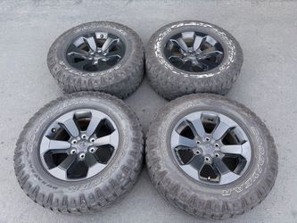 (4) 18β Dodge Ram Wheels 275/70R18 Goodyear Wrangler