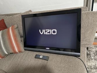 Vizio smart tv with wall mount and remote