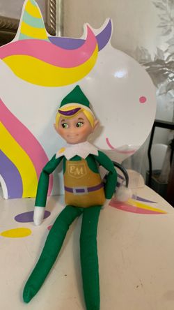 Elf On The Shelf with scarf and earmuffs