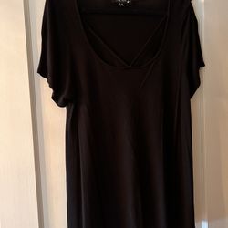 Black lightweight top with cut out at the neck. mid length or slightly longer. 