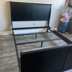 Brand new queen size black wood sleigh bed frame. 