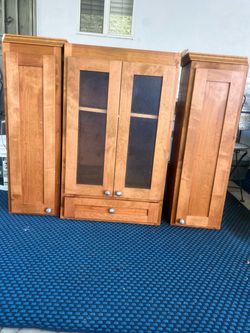 Solid wood cabinets excellent condition glass doors with drawers and adjustable shelves