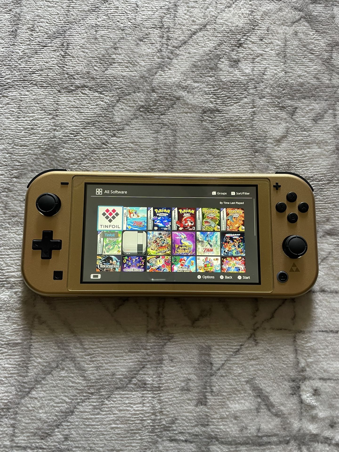 Nintendo Switch Lite Hyrule Edition With Games