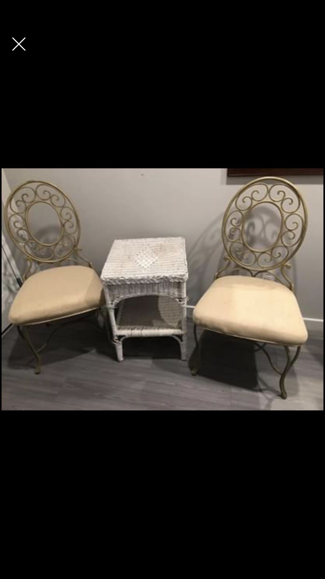 two metal patio chairs and a table for all $ 30