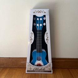 UKULELE WITH ADJUSTABLE TUNING PEGS 6" X 16"