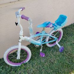 Huffy Frozen 16 inch Bike with Training Wheels. Good Condition 