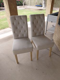 Upholstered cream colored dining chairs, set of 2
