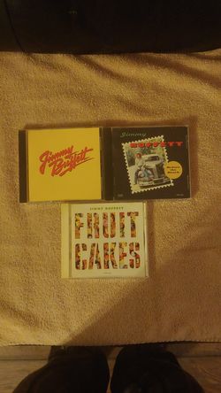3 Jimmy buffett cd's
