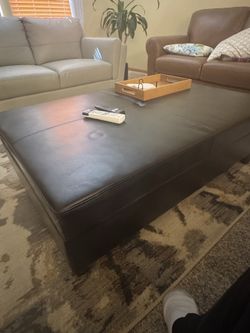 48” wide brown faux leather ottoman