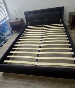 Queen bed set with LED lights on headboard and two nightstands