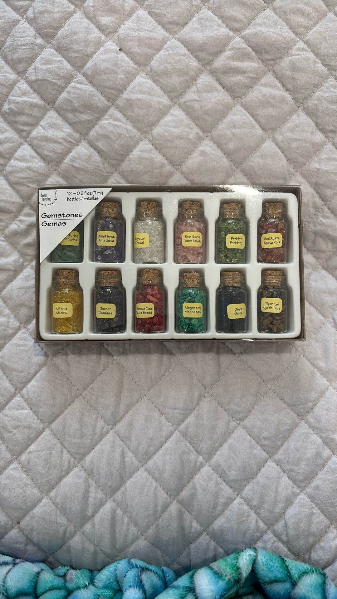 different gemstone bottles (not opened)