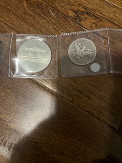 Austrian Philharmonic Silver Coin and US Barber Half Dollar