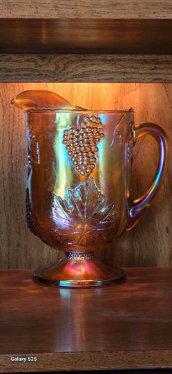 Vintage marigold carnival glass pitcher  with grapes and leaves, 10"
