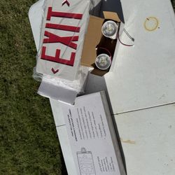 NEW NEVER USED EXIT SIGNS