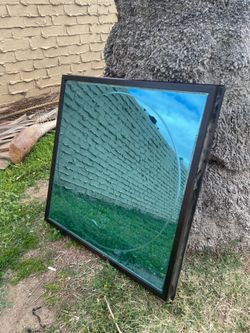 vintage Henredon circle-in-square wall mirror worth $1k