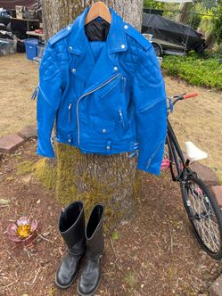 Blue leather motor cycle jacket and matching leather pants