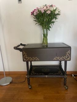 Wooden bar table on wheels