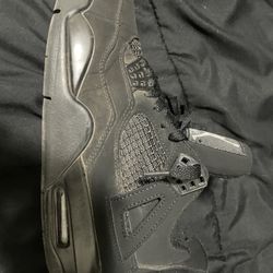 black cats jordan 4s