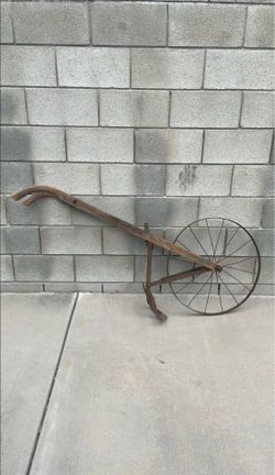 Antique Single Wheel Push Plow