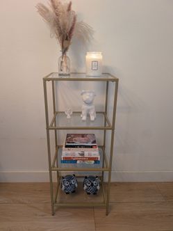 Glass and gold metal book shelf
